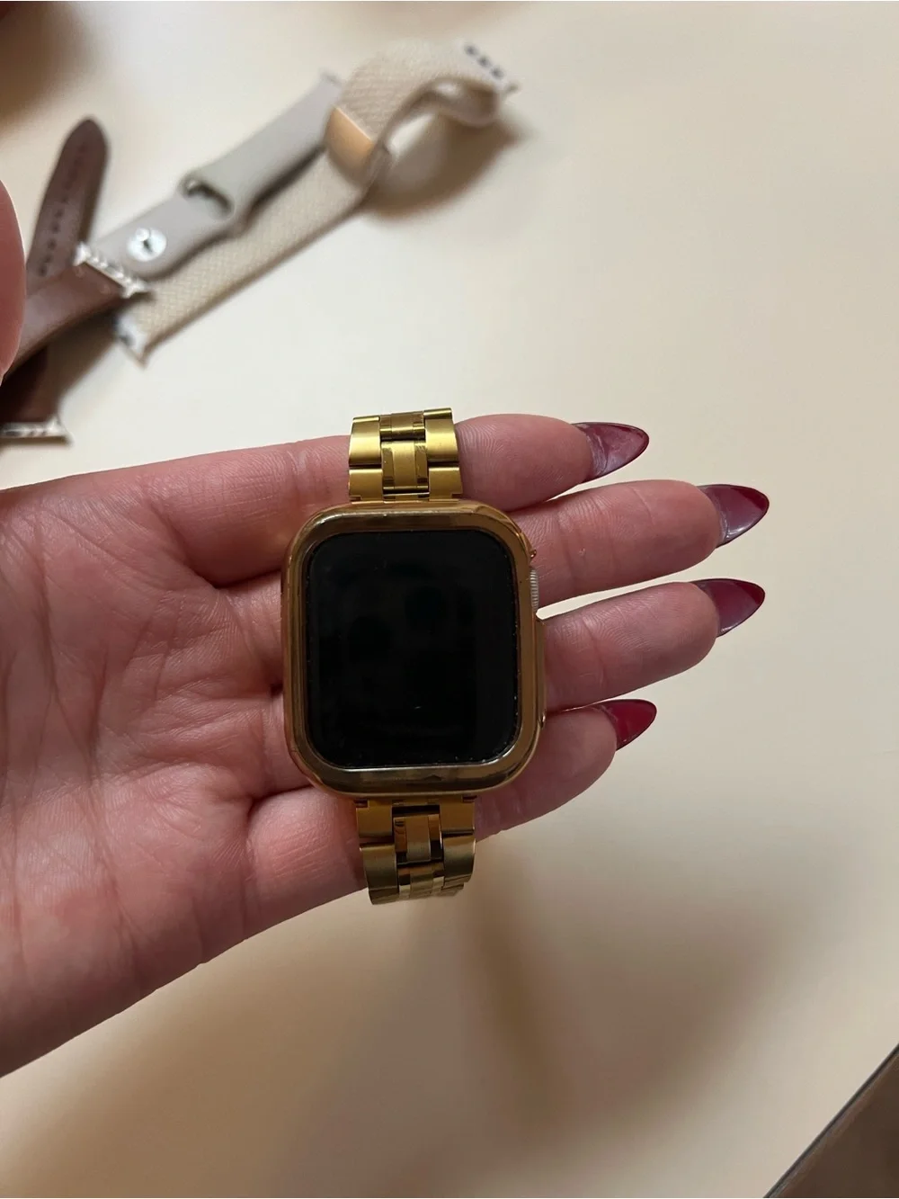 Apple silver stainless steel smartwatch with link band and case